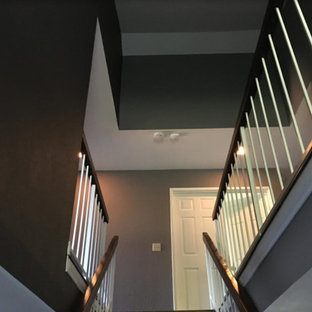 Inspiration for a mid-sized timeless straight wood railing staircase remodel in Los Angeles