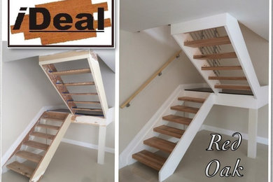 Staircase - mid-sized contemporary wooden u-shaped metal railing staircase idea in Other