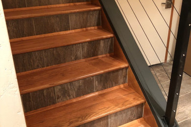 Remodel- cable railings, tile, trim, hardwood stairs.