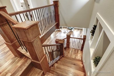 Example of an arts and crafts staircase design in Other