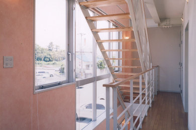Inspiration for a contemporary wooden straight open staircase remodel in Bridgeport