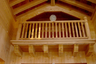 Example of a mid-sized mountain style wooden straight staircase design in Chicago with wooden risers