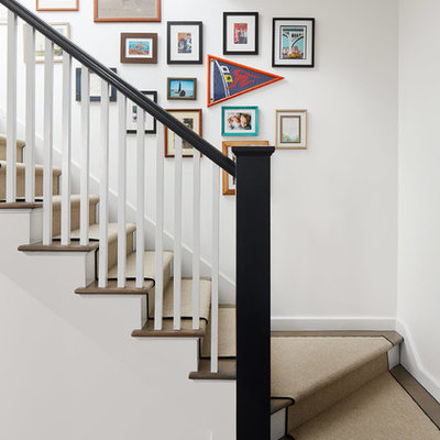 Mid-sized transitional wooden l-shaped wood railing staircase photo in Chicago with painted risers