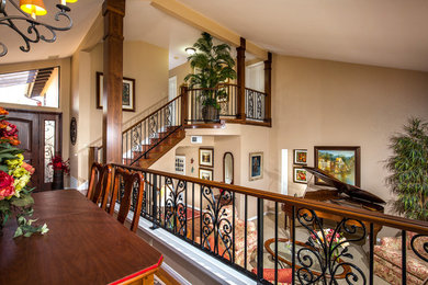 Example of a mid-sized transitional wooden straight staircase design in San Diego with wooden risers