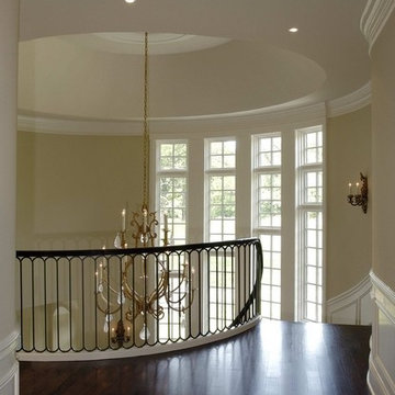 Second Floor Landing with Curved Staircase in Turret