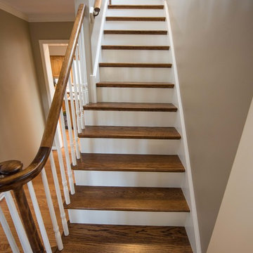 Whie Wooden Stairs with Brown Railings