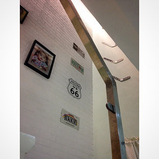 Inspiration for a small shabby-chic style wooden straight staircase remodel in Other with wooden risers