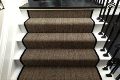Design ideas for a small rustic carpeted straight staircase in London with wood risers.