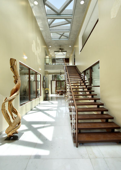 Contemporary Staircase by Dipen Gada and Associates