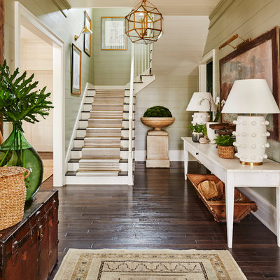 Beach style carpeted l-shaped wood railing staircase photo in Other with carpeted risers