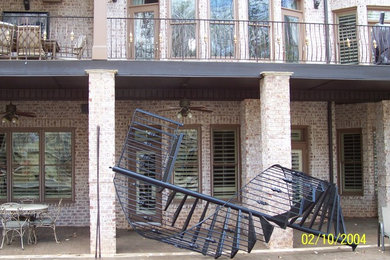 Mid-sized tuscan metal spiral staircase photo in Atlanta with metal risers