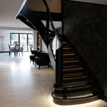 Stained Beech staircase with glass balustrade