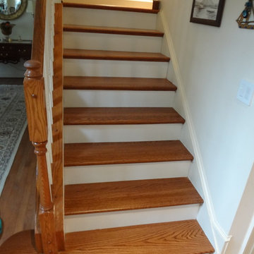 Stained oak treads, painted risers with starter step