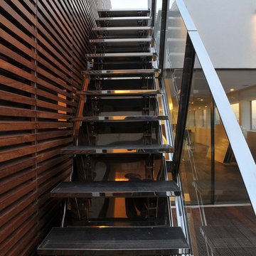 Stainless steel staircase and glass balustrade0