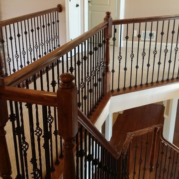 Stair railings with wrought iron balusters