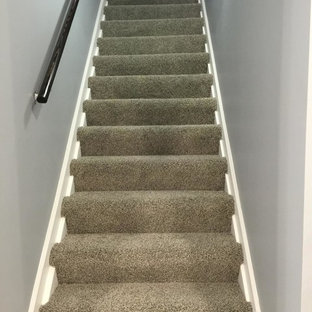 Staircase - mid-sized carpeted straight staircase idea in Minneapolis with carpeted risers