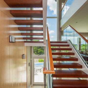Staircase and lake view— 2014 Lakeway Warm Contemporary Waterfront Custom Home o
