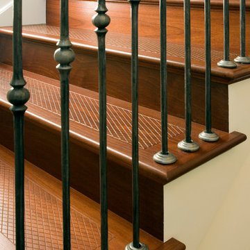 Staircase features Jarrah Treads and Risers with Round Iron Balusters