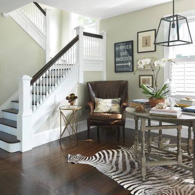 Example of a classic wooden wood railing staircase design in Providence