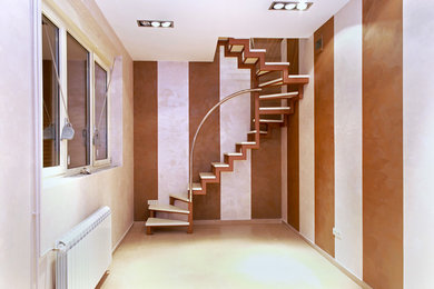 Inspiration for a mid-sized modern spiral open staircase remodel in New York