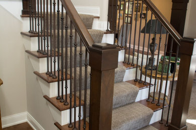 Staircase - mid-sized transitional wooden l-shaped mixed material railing staircase idea in Minneapolis with painted risers