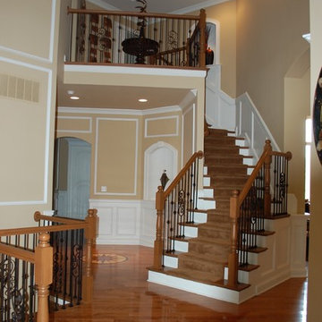 Staircase with iron spindles of European Traditional Home