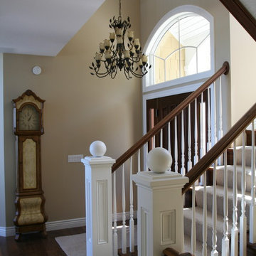 Staircase with painted newels