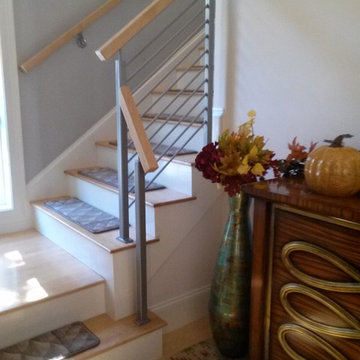 Staircase Wrought Iron Railing with a Maple Wooden Cap