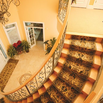 Staircases featuring runners and Zoroufy stair rods