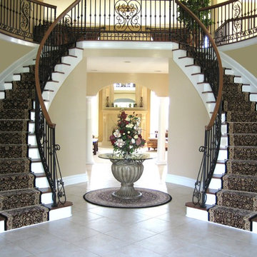 Staircases featuring runners and Zoroufy stair rods