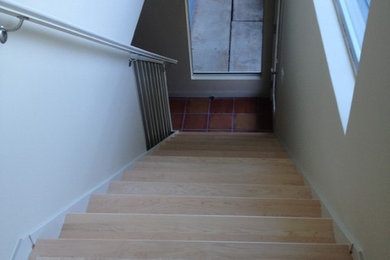 Design ideas for a traditional wood metal railing staircase in San Francisco with metal risers.