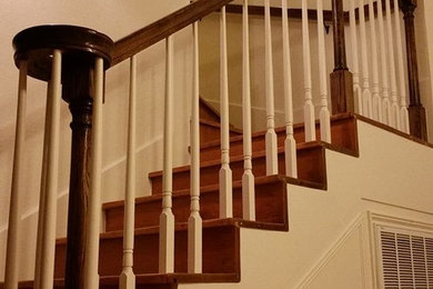 Inspiration for a mid-sized timeless wooden u-shaped staircase remodel in Austin with wooden risers