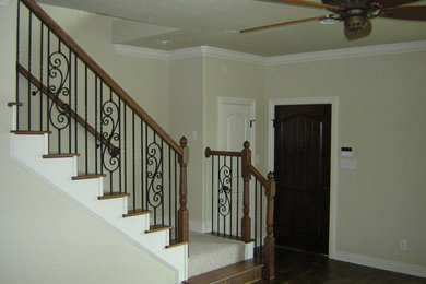 Staircase - mid-sized traditional carpeted l-shaped staircase idea in Dallas with carpeted risers