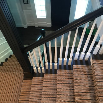 Stairway runners - Ebony rails polish the whole look