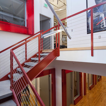 Red Stairwell in San Francisco Loft with White Walls