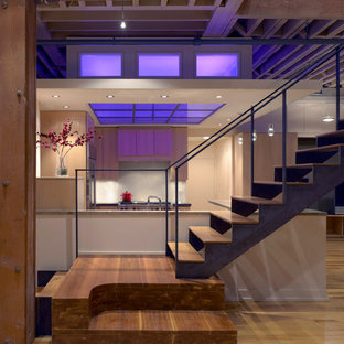 Mid-sized urban wooden straight open staircase photo in Chicago