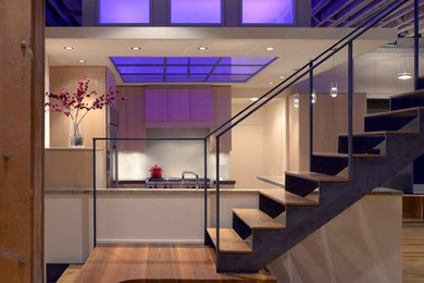 Design ideas for a medium sized urban wood straight staircase in Chicago with open risers.