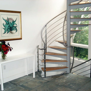 Stunning Spiral Stair with Stainless Steel Multiline Rail and Oak Treads