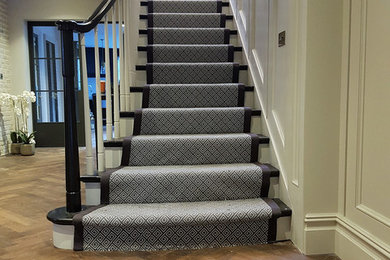 Stunning Staircase Carpet with Maroon Trim and Grecian Detail