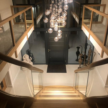 T shape Oak staircase with glass balustrade