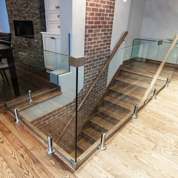 Tempered glass railing with stainless steel