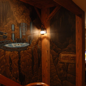 The Bat Cave Themed Mural in a stairway and lower level by Tom Taylor