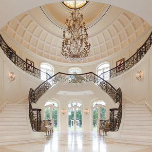 Staircase - huge mediterranean curved staircase idea in Chicago