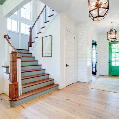 Inspiration for a large country wooden u-shaped wood railing staircase remodel in Richmond with painted risers