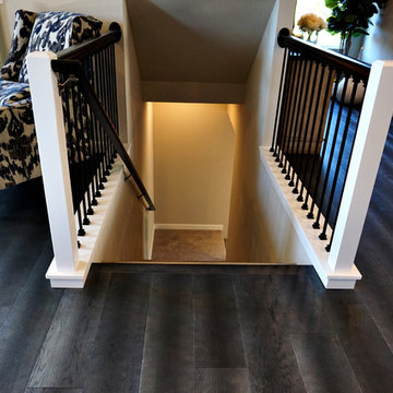 The Ramsey Model Home Living Room Stairs to Lower Level by Sea Pac Homes