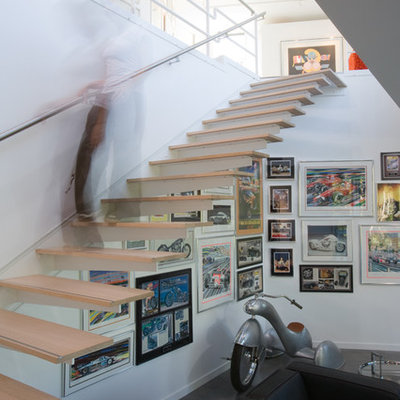 Inspiration for a modern floating open staircase remodel in Kansas City