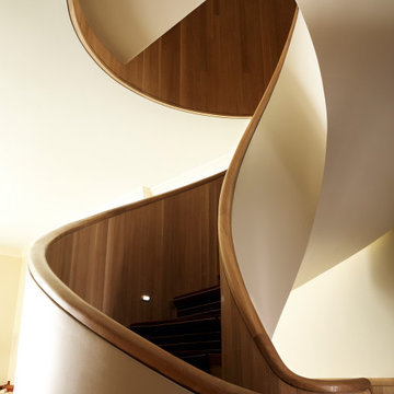 This remarkably elegant spiral stair is the centerpiece of this UWS home