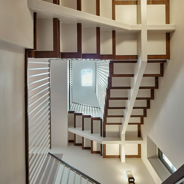 Three Story Staircase with Skylight