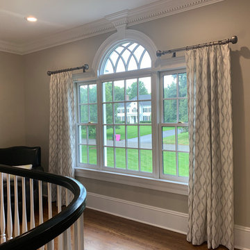 Top Pleated Drapery Panels on Decorative Metal Rods on Specialty Windows