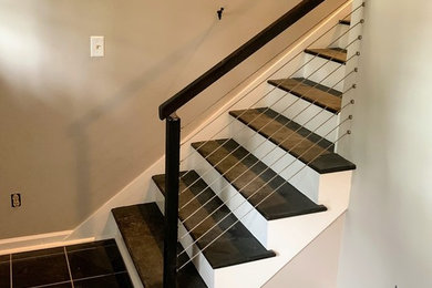 Inspiration for a mid-sized contemporary tile straight metal railing staircase remodel in Atlanta with painted risers